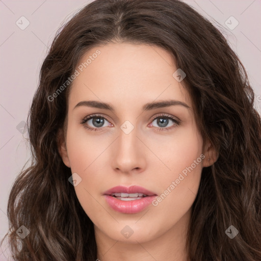 Neutral white young-adult female with long  brown hair and brown eyes