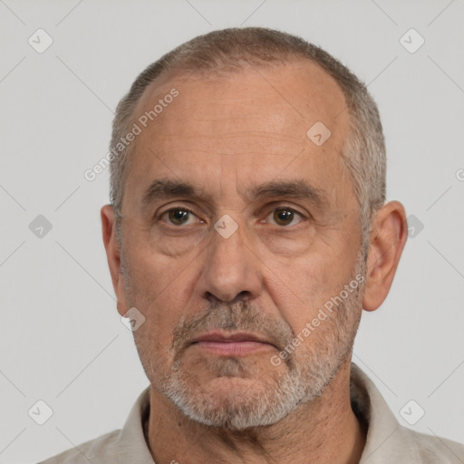 Neutral white middle-aged male with short  gray hair and brown eyes