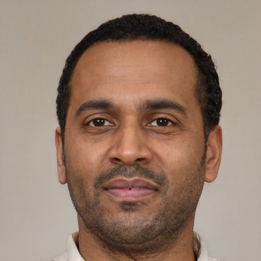 Neutral latino adult male with short  black hair and brown eyes