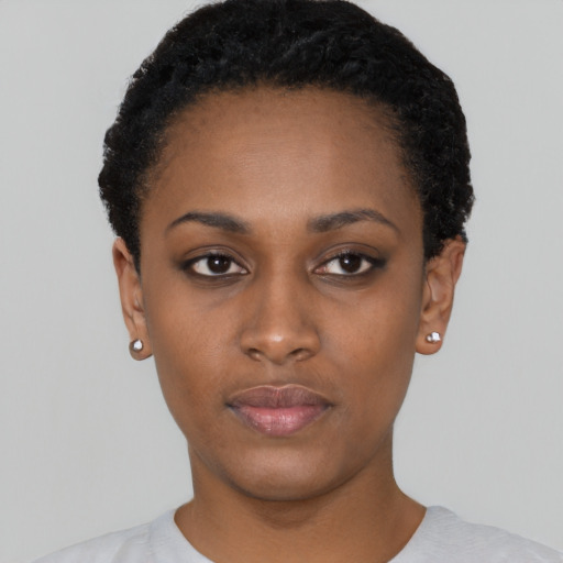 Neutral black young-adult female with short  black hair and brown eyes