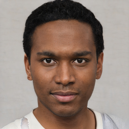 Neutral black young-adult male with short  black hair and brown eyes