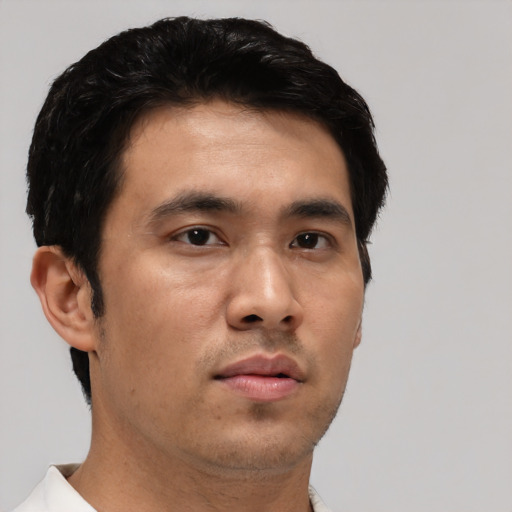 Neutral asian young-adult male with short  black hair and brown eyes