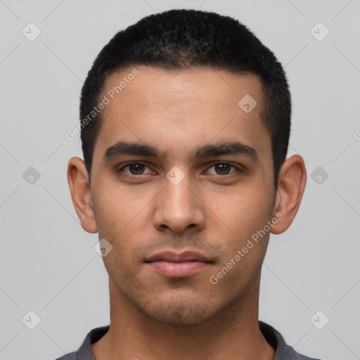 Neutral latino young-adult male with short  black hair and brown eyes