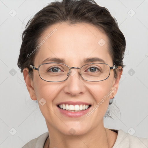 Joyful white adult female with medium  brown hair and grey eyes