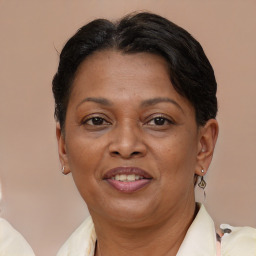 Joyful white adult female with short  brown hair and brown eyes