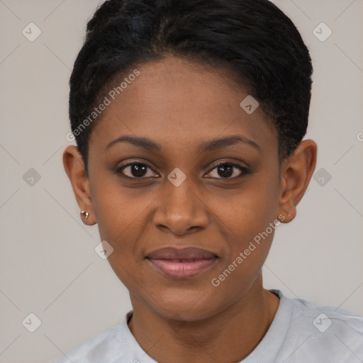 Joyful black young-adult female with short  black hair and brown eyes