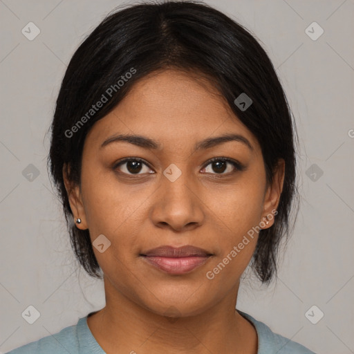 Joyful asian young-adult female with medium  black hair and brown eyes