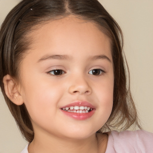 Joyful white child female with medium  brown hair and brown eyes