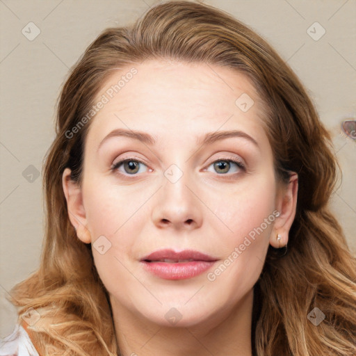 Joyful white young-adult female with long  brown hair and blue eyes