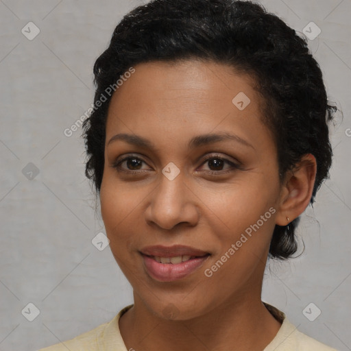 Joyful latino young-adult female with short  black hair and brown eyes