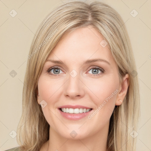 Joyful white young-adult female with long  brown hair and green eyes