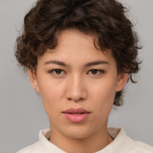 Neutral white young-adult female with short  brown hair and brown eyes