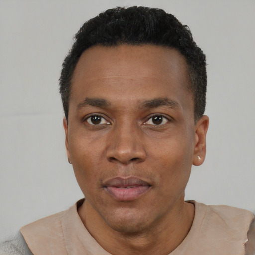 Neutral black young-adult male with short  black hair and brown eyes