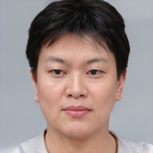 Neutral asian young-adult female with short  brown hair and brown eyes