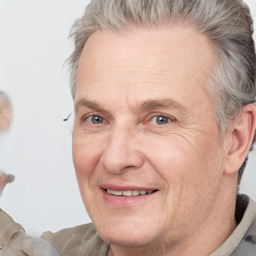 Joyful white middle-aged male with short  brown hair and grey eyes