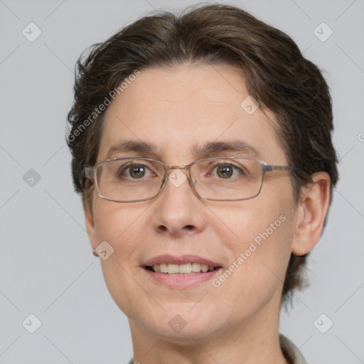 Joyful white adult female with short  brown hair and brown eyes