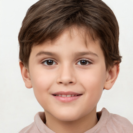 Joyful white child male with short  brown hair and brown eyes