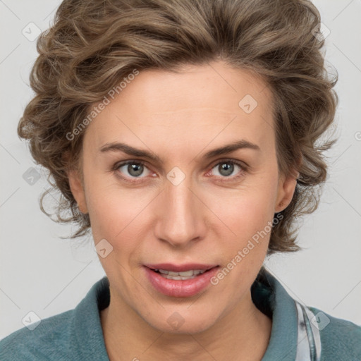 Joyful white young-adult female with medium  brown hair and blue eyes