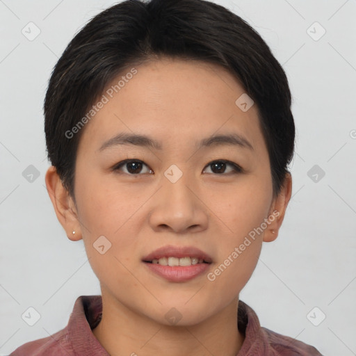 Joyful asian young-adult female with short  brown hair and brown eyes