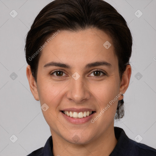 Joyful white young-adult female with short  brown hair and brown eyes