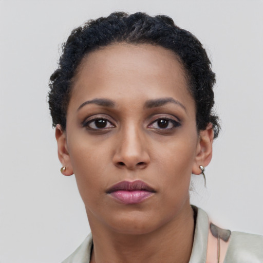 Neutral black young-adult female with short  black hair and brown eyes