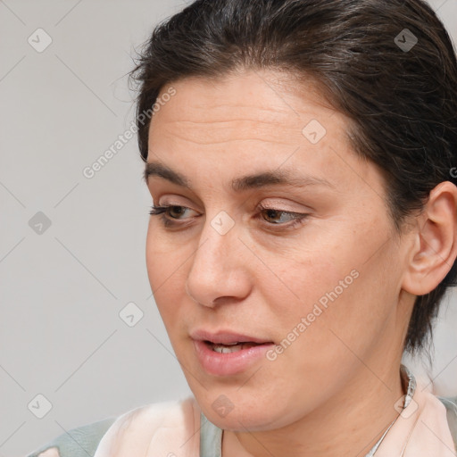 Joyful white adult female with short  brown hair and brown eyes