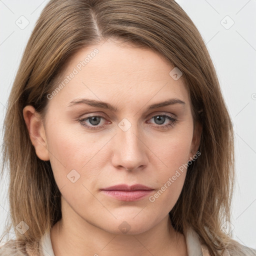 Neutral white young-adult female with long  brown hair and grey eyes