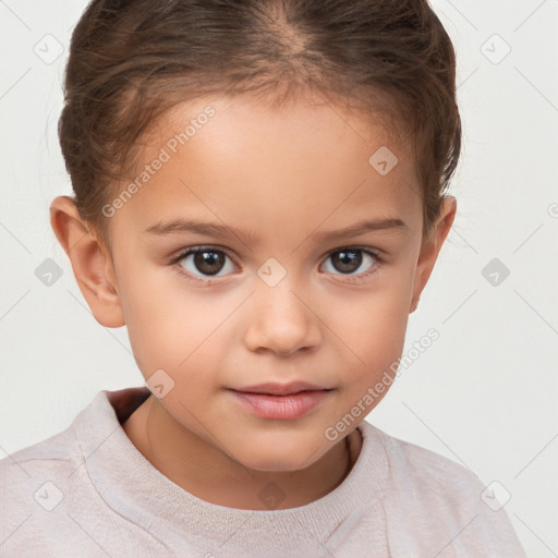 Joyful white child female with short  brown hair and brown eyes