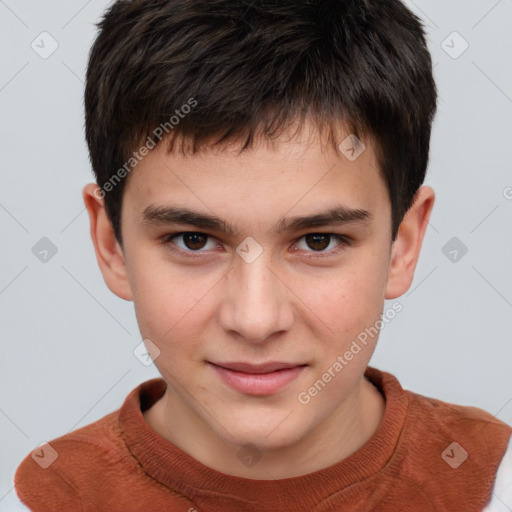 Joyful white child male with short  brown hair and brown eyes