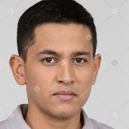 Neutral white young-adult male with short  brown hair and brown eyes