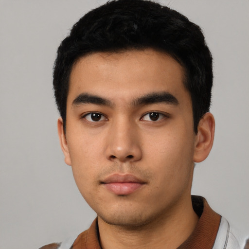 Neutral asian young-adult male with short  black hair and brown eyes