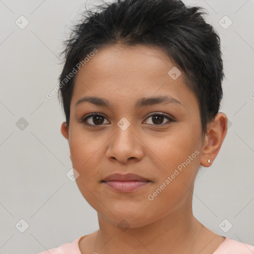 Joyful latino young-adult female with short  brown hair and brown eyes