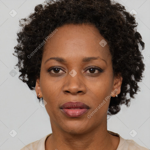 Neutral black adult female with short  black hair and brown eyes