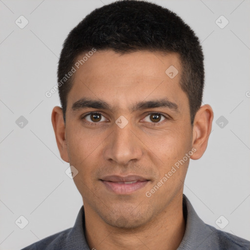 Joyful white young-adult male with short  black hair and brown eyes