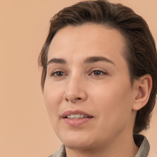 Joyful white young-adult female with medium  brown hair and brown eyes