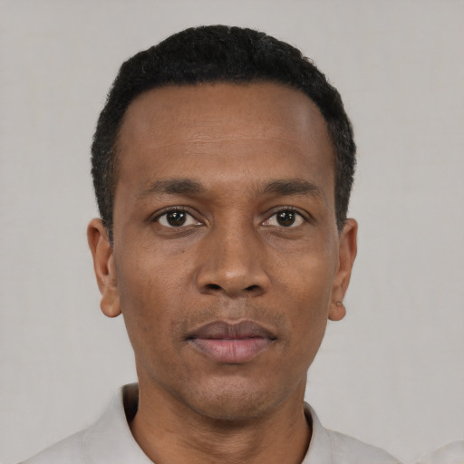 Neutral black young-adult male with short  black hair and brown eyes