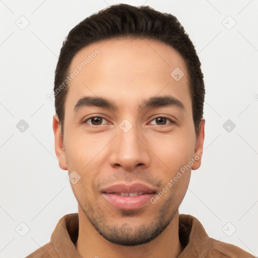 Joyful white young-adult male with short  brown hair and brown eyes