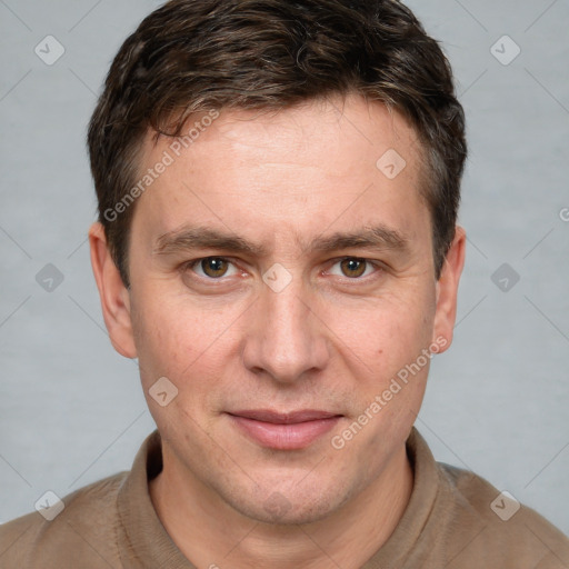 Joyful white adult male with short  brown hair and grey eyes