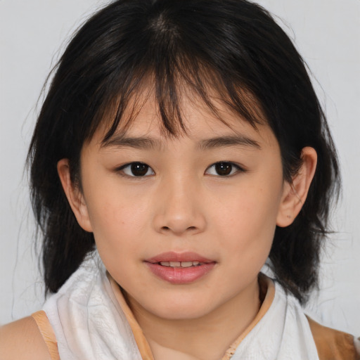 Joyful asian child female with medium  brown hair and brown eyes