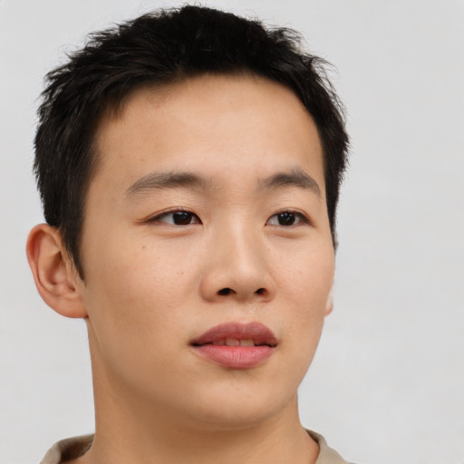 Neutral asian young-adult male with short  brown hair and brown eyes