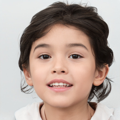 Joyful white child female with medium  brown hair and brown eyes