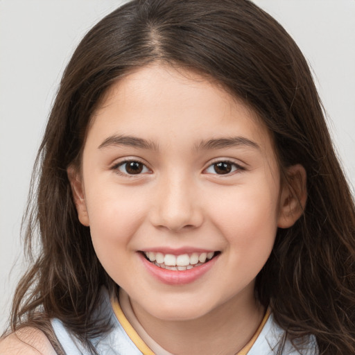 Joyful white child female with medium  brown hair and brown eyes