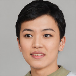 Joyful asian young-adult female with short  black hair and brown eyes