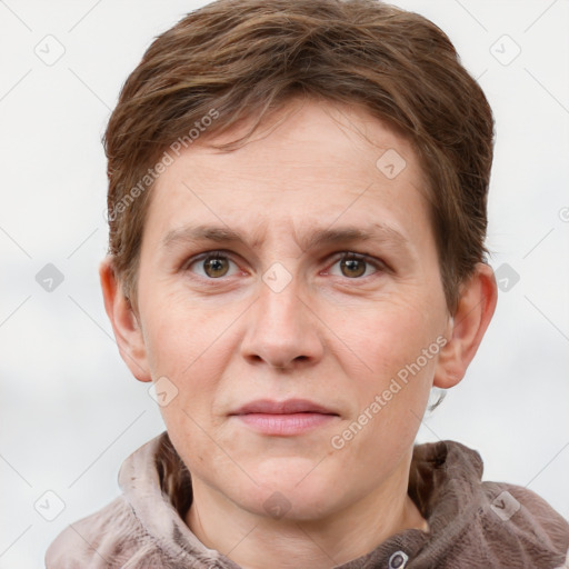 Joyful white adult male with short  brown hair and grey eyes