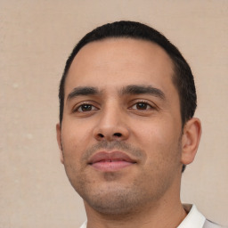 Neutral white young-adult male with short  black hair and brown eyes