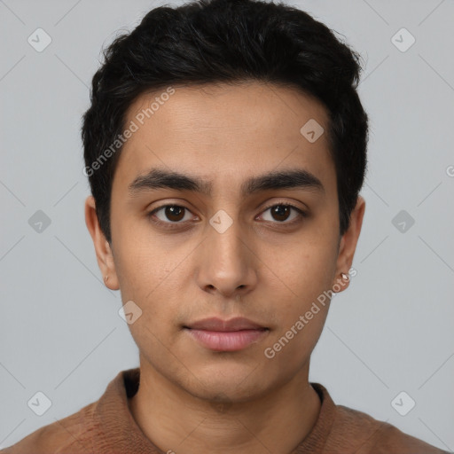 Neutral latino young-adult male with short  black hair and brown eyes