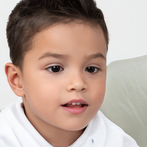 Joyful white child female with short  brown hair and brown eyes