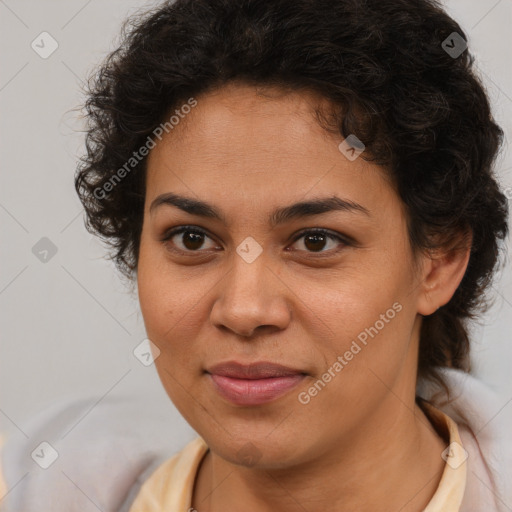 Joyful latino young-adult female with short  brown hair and brown eyes