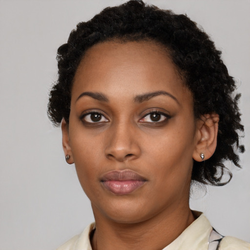 Neutral black young-adult female with short  black hair and brown eyes
