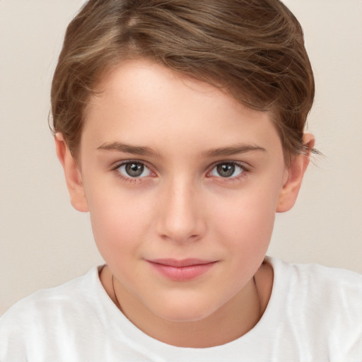 Joyful white child female with short  brown hair and brown eyes